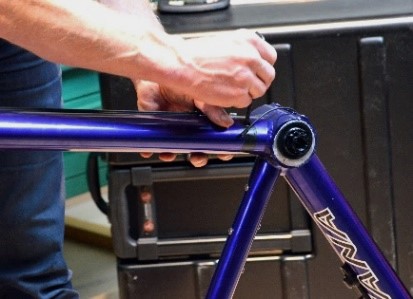 loosely screw the bottom tube to the front frame